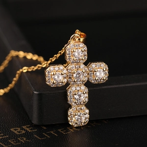 Classic gold-plated cross pendant necklace with micro-paved cubic zirconia crystals