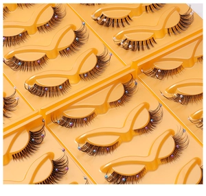 Detail of 5 pairs of fox-eye false eyelashes with colorful pearl bead decorations