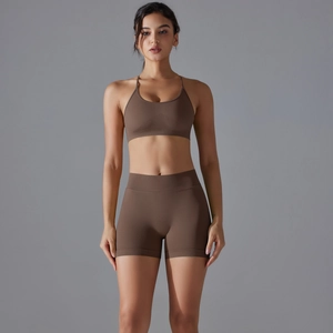 Front view of seamless chocolate brown sports bra and high-waist shorts fitness set