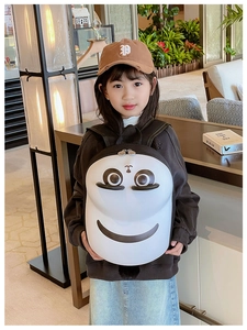 Detail of hard shell panda cartoon kids backpack showing dual zippers and cute design