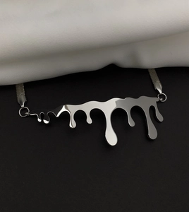Minimalist silver-toned fluid pendant necklace on flat snake chain with polished finish
