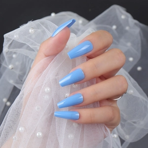 Glossy light blue long coffin press-on nails with shiny UV finish shown on hands