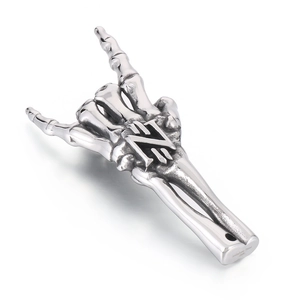 Gothic skull hand pendant in polished stainless steel with vintage dark rock style