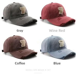 Distressed vintage baseball caps in four colors featuring patch embroidery details