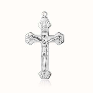 Detailed view of silver cross pendant with Jesus relief and INRI engraving on white background