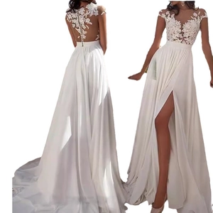 Elegant white lace wedding dress with a deep V-neck, high slit, and back button details