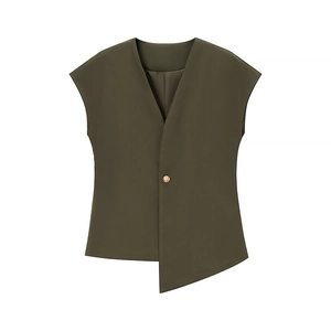 Detail of army green sleeveless vest featuring a single gold button and asymmetrical hem