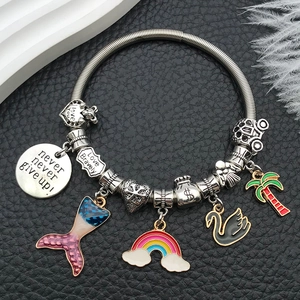 Silver snake chain bracelet featuring colorful enamel mermaid and inspirational charms