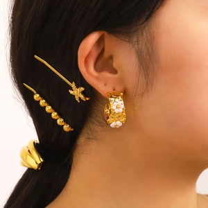 Gold C-shaped pleated earrings with pearls and floral details with matching hairpins