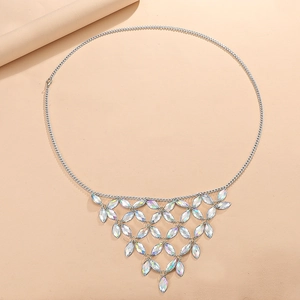 Detail of silver body chain featuring mesh net design and colorful marquise rhinestones