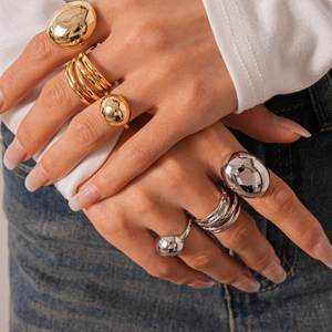 Three-piece chunky metallic geometric ring set in gold and silver finish for women