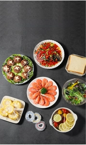 Elastic food covers shown on various plates including fish, shrimp, and vegetables