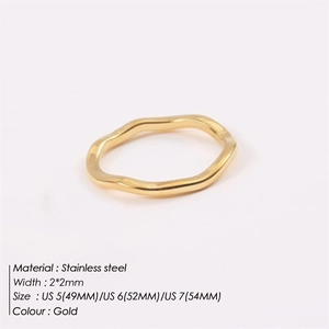 Detail view of wave-style gold stainless steel ring with 2mm width specifications