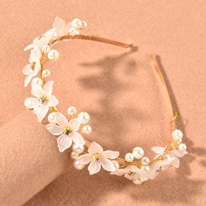 Elegant rose gold flower and pearl headband for wedding and party hair styling