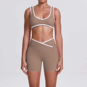 Detail of V-shaped crossover high waist shorts and contrast binding in mocha yoga set