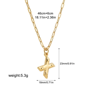 Detail of gold X pendant on paperclip chain with 46cm+6cm length and 5.3g weight