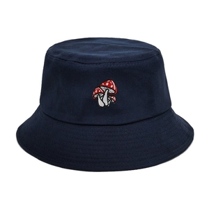 Navy blue cotton bucket hat with cute red mushroom embroidery on white background