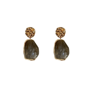 Retro geometric resin earrings with hammered gold metal pieces and translucent grey pendants