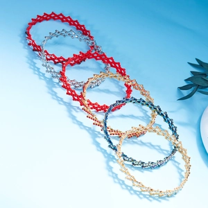 Detail of colorful rhinestone retractable rings showing six flexible diamond mesh styles