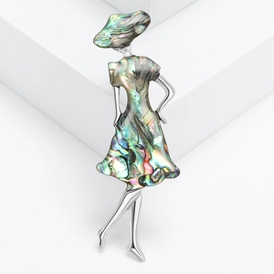 Elegant lady with hat brooch crafted with abalone shell in silver setting