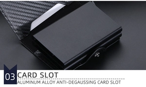 Close-up of the RFID blocking aluminum alloy card slot and carbon fiber texture detail