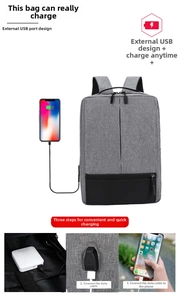 Detail view of Oxford laptop backpack featuring an external USB charging port interface