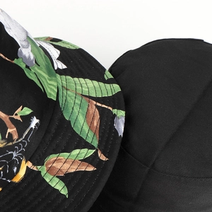 Close-up of the durable twill cotton fabric and floral print details of bucket hat