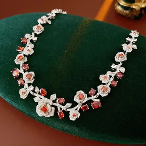 Vintage rose flower necklace set with red zircon stones on silver-tone metal base