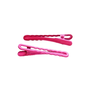 Pair of pink gradient wave pattern metal hair clips on a clean white background