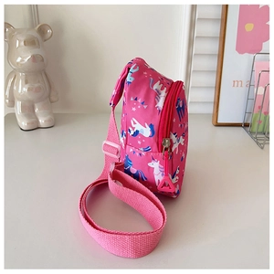 Detailed side view of pink kids chest bag featuring colorful unicorn prints and zipper