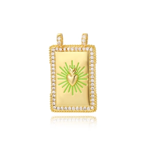 Detail of square gold heart pendant with green enamel rays and pave crystal border