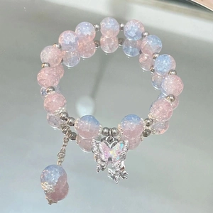 Pink and blue gradient beaded bracelet with silver butterfly charm and ice-crack pattern