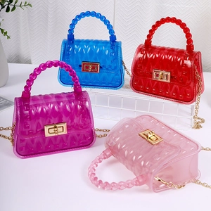 Mini PVC jelly handbags with leaf pattern and gold chain strap in vibrant colors