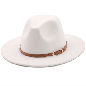 Close-up of white wool fedora hat featuring a brown leather band and gold buckle