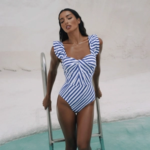 Blue and white striped one-piece swimsuit with ruffle straps and front twist knot detail
