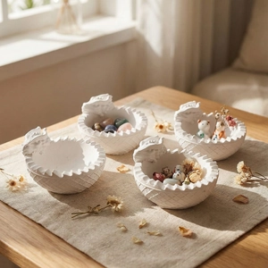 White resin storage bowls with dragon head design and textured lattice pattern