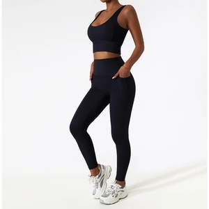 Detail view of high-waisted yoga leggings with side pockets and smooth sports fabric