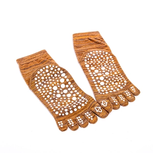 Brown knit five-toe yoga socks featuring white anti-slip silicone grips on bottom