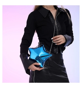 Glossy electric blue star-shaped acrylic evening bag with a silver chain strap