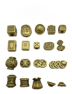 Detail view of 18 styles of antique bronze ethnic beads with Chinese character engravings