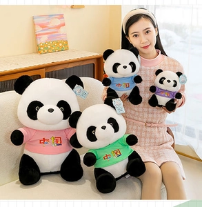 Detailed shot of cute panda plush dolls wearing colorful China souvenir t-shirts