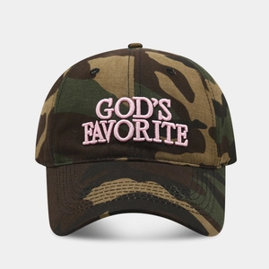 Detail of pink embroidered God's Favorite text on a camouflage baseball cap fabric