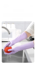 Close-up of long thick light purple nitrile gloves for waterproof kitchen cleaning