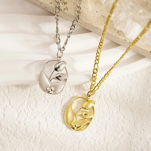 Vintage hollow tulip pendant necklace in gold and silver finish with O-chain