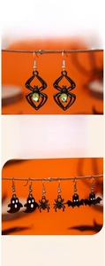 Detalle de pendientes de Halloween con motivos de araña y fantasma sobre fondo naranja