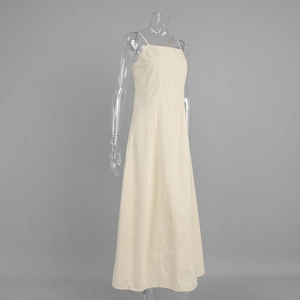 Detailed side view showing the vertical seam lines and A-line cut of the cotton maxi dress