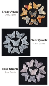 Detailed view of butterfly charms in natural crazy agate, clear quartz and rose quartz