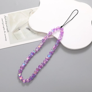 Detail of purple iridescent heart-shaped beads on a short wrist strap mobile lanyard