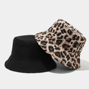 Dual-style reversible leopard print and solid black canvas bucket hats for sun protection