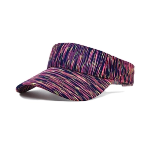 Close-up of vibrant tie-dye striped sun visor with breathable sweat-wicking fabric detail